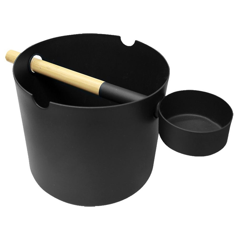 Black KOLO sauna bucket with bamboo-handled ladle hooked on the rim