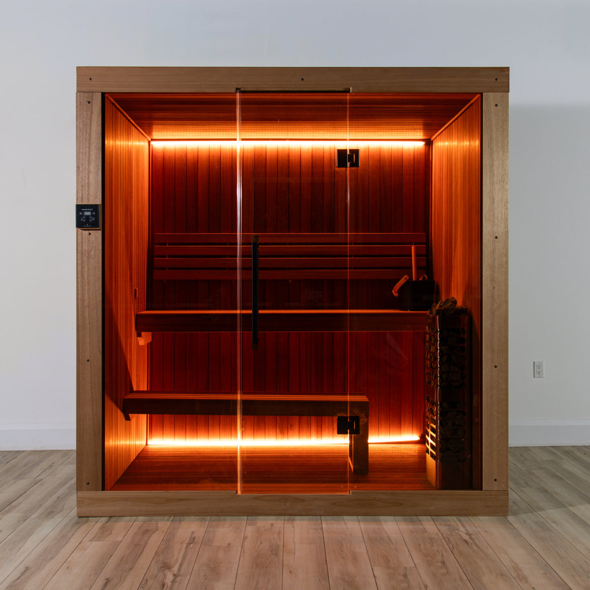 Front view of the Dundalk Leisurecraft Element Studio 4 Person Traditional Indoor Sauna with warm LED lighting