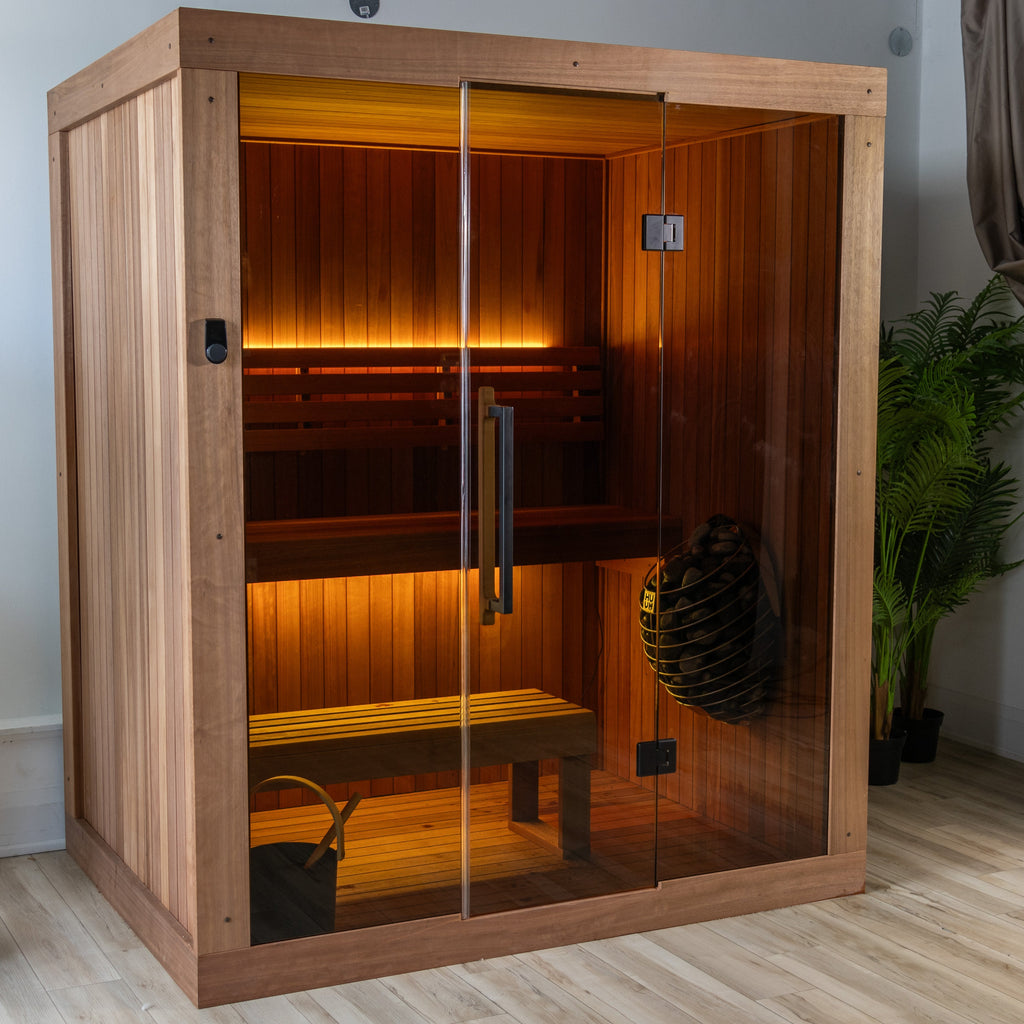 Angled view of the Dundalk Leisurecraft Element Loft 3 Person Traditional Indoor Sauna with glass door