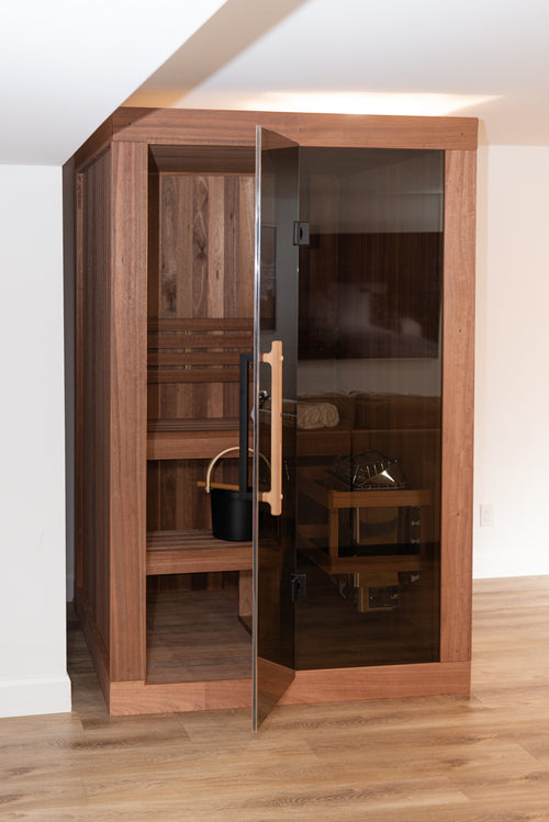 Front view of the Dundalk Leisurecraft Element Nook 1-2 Person Traditional Indoor Sauna with the door open