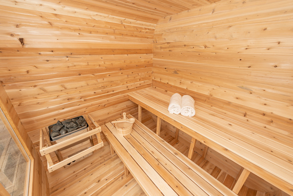 Interior of the Dundalk CT Luna 4-Person Outdoor Sauna with benches and heater