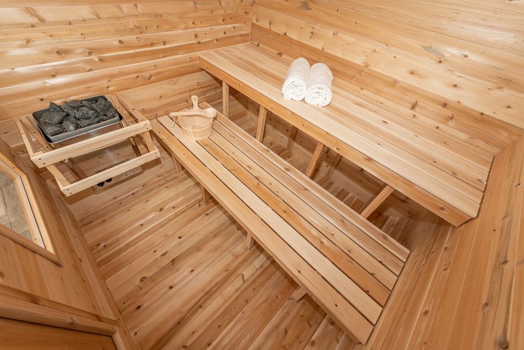 Heater and benches inside the Dundalk CT Luna 4-Person Outdoor Sauna