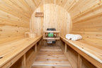 Interior of the Dundalk CT Harmony 4-Person Outdoor Barrel Sauna with benches and heater