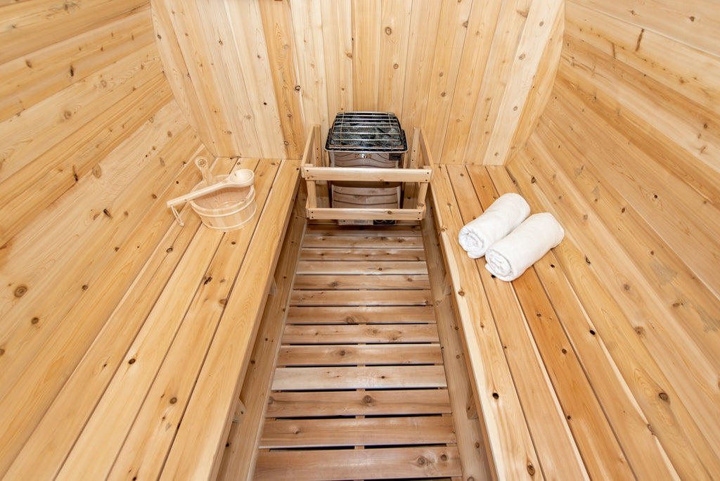 Aisle and benches inside the Dundalk CT Harmony 4-Person Outdoor Barrel Sauna