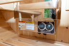 Heater control panel and warning labels inside the Dundalk CT Harmony 4-Person Outdoor Barrel Sauna