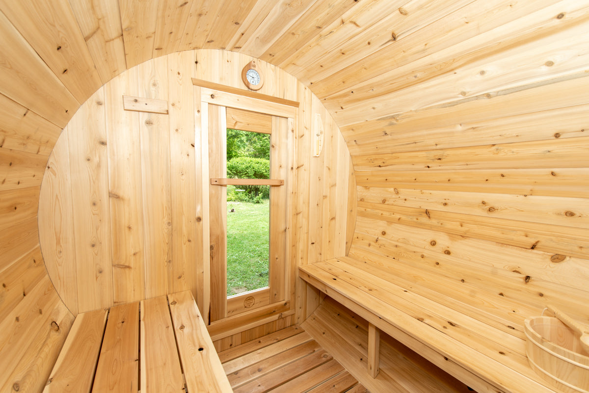 Window at the end of the Dundalk CT Harmony 4-Person Outdoor Barrel Sauna interior