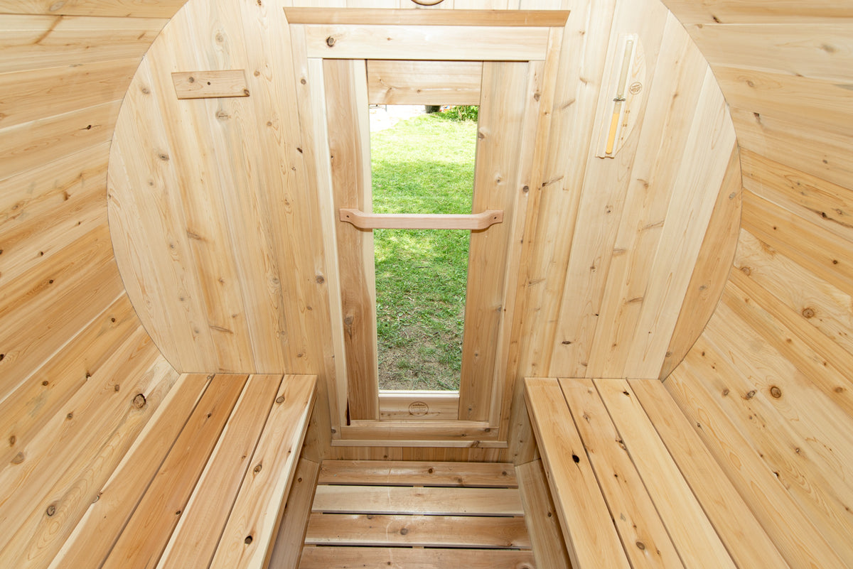 Benches and aisle inside the Dundalk CT Harmony 4-Person Outdoor Barrel Sauna