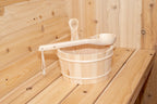 Wooden bucket and ladle on the bench inside the Dundalk CT Harmony 4-Person Outdoor Barrel Sauna