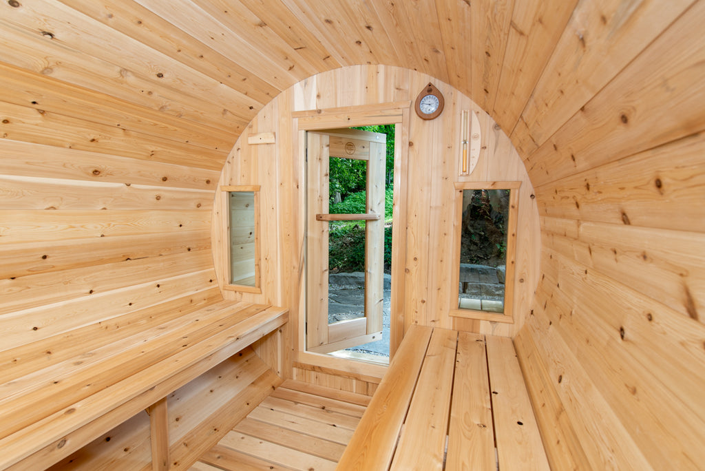 Door and windows at the end of the Dundalk CT Tranquility 6-Person Outdoor Barrel Sauna interior