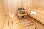 Interior of the Dundalk CT Tranquility 6-Person Outdoor Barrel Sauna with towels on the bench