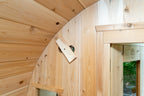 Glass door and curved wall inside the Dundalk CT Tranquility 6-Person Outdoor Barrel Sauna