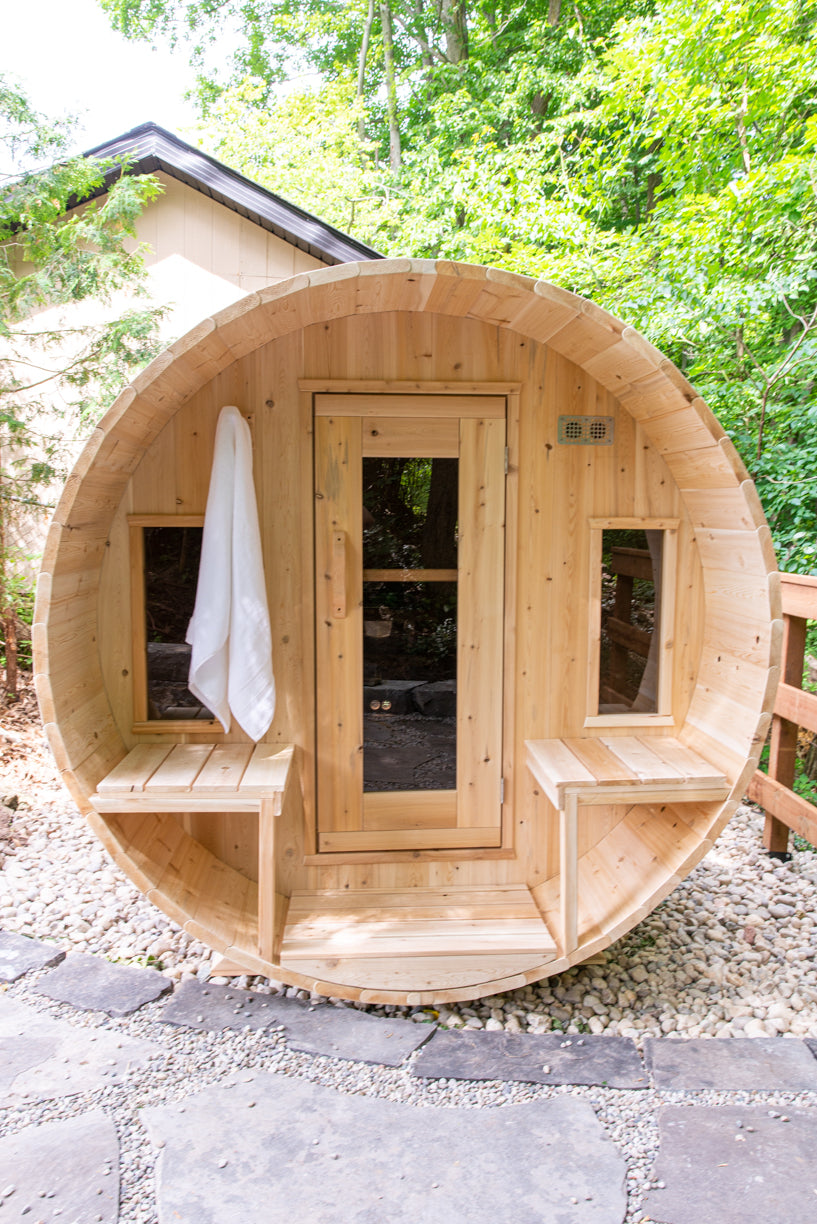 Front view of the Dundalk CT Tranquility 6-Person Outdoor Barrel Sauna with open door