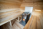 Wood stove and cedar benches inside the Dundalk CT MiniPOD 4-Person Sauna