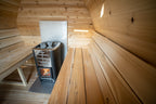 Cedar benches and wood stove inside the Dundalk CT MiniPOD 4-Person Sauna