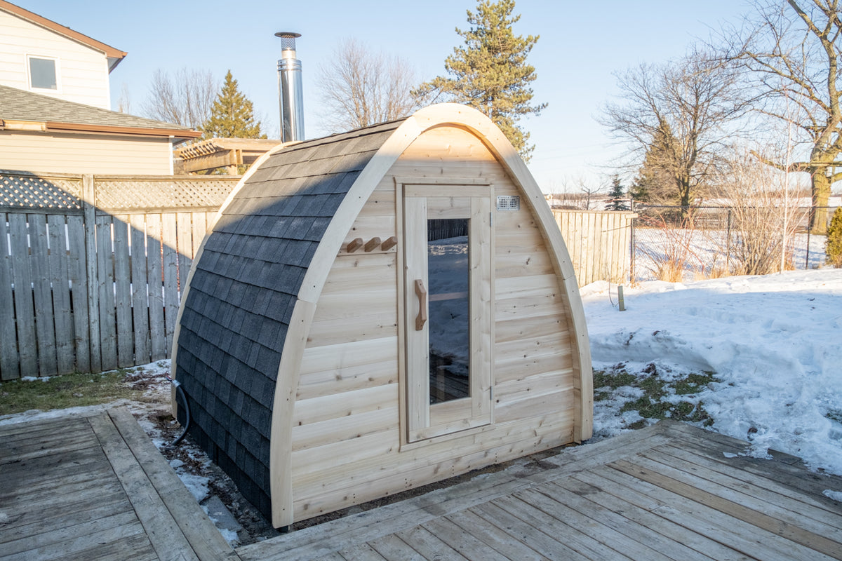Side view of the Dundalk CT MiniPOD 4-Person Sauna with black shingle roof