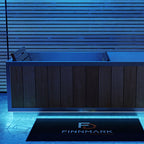 Finnmark SoulCold plunge tub with dark stained wood panels and blue LED lighting