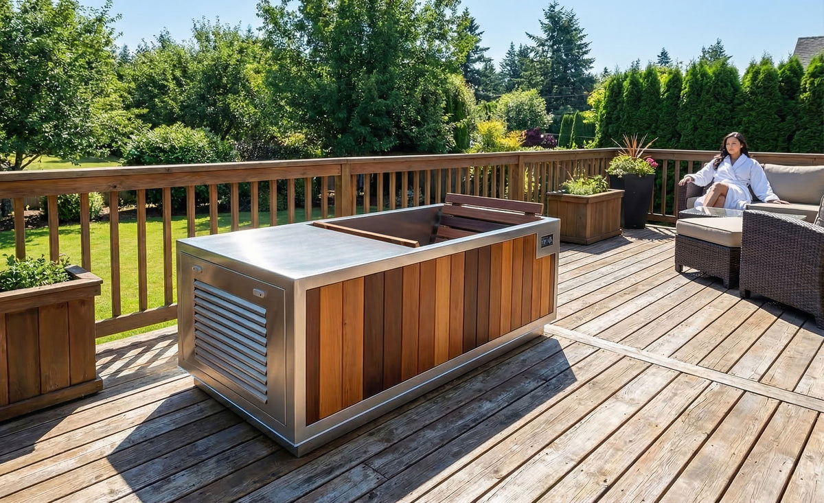 Finnmark SoulCold plunge tub on a wooden deck with a person relaxing nearby
