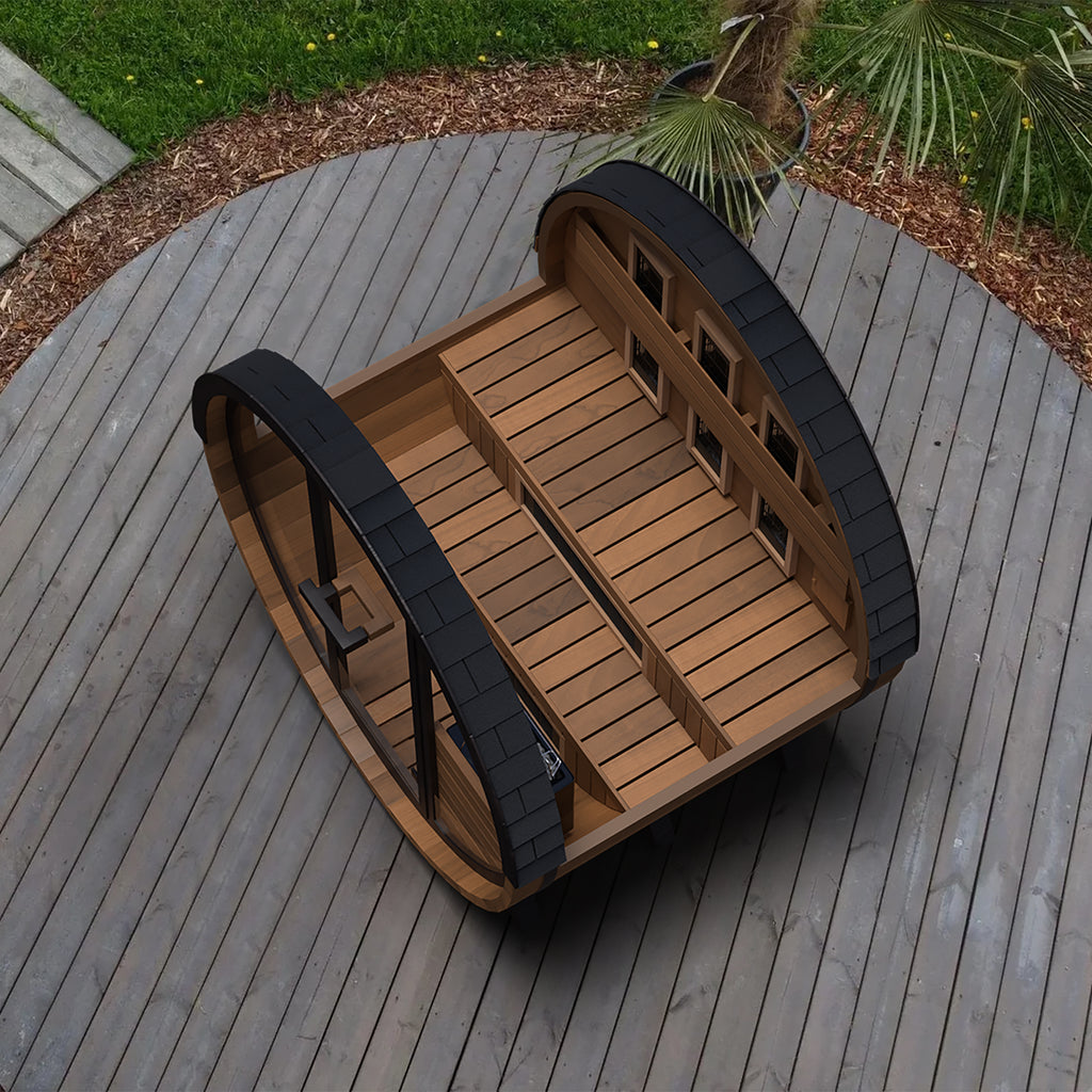 Finnmark FD-6 barrel sauna outdoors by day with the door open