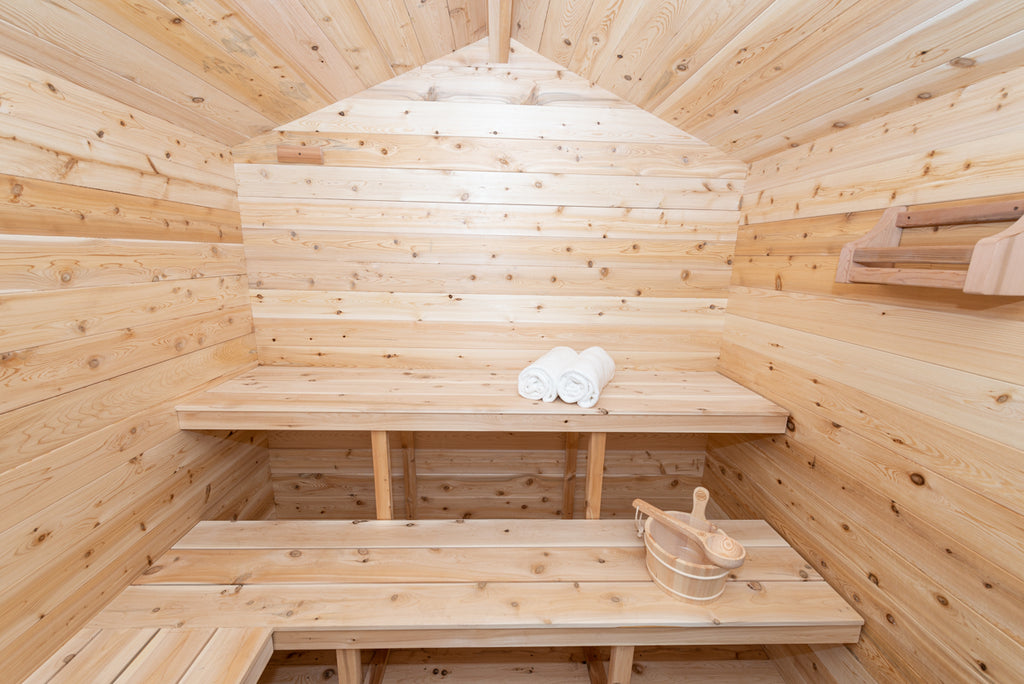 Cedar benches inside the Dundalk CT Georgian 6-Person Outdoor Cabin Sauna