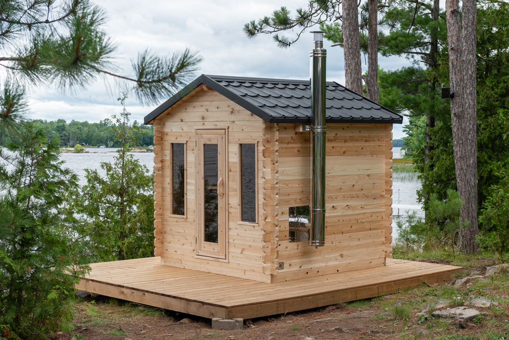 Dundalk CT Georgian 6-Person Outdoor Cabin Sauna on a deck beside a lake