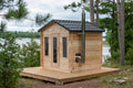 Dundalk CT Georgian 6-Person Outdoor Cabin Sauna on a deck beside a lake