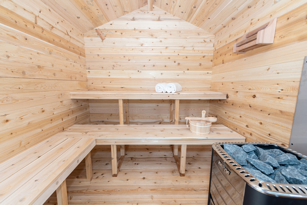 Interior of the Dundalk CT Georgian 6-Person Outdoor Cabin Sauna with heater and benches