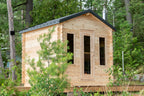 Dundalk CT Georgian 6-Person Outdoor Cabin Sauna exterior with windows in a woodland setting