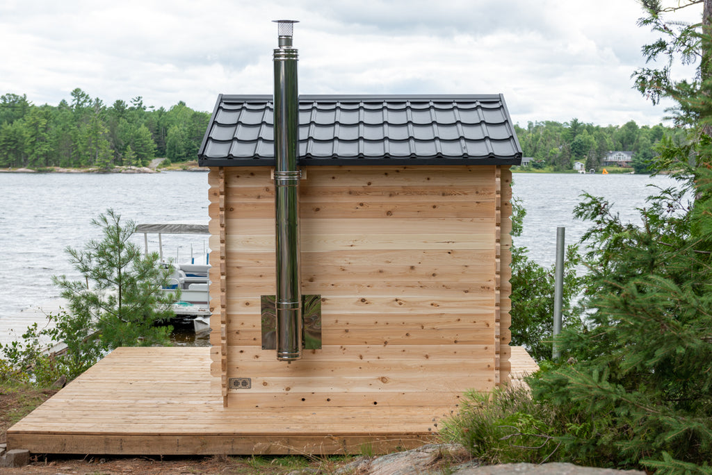 Dundalk CT Georgian 6-Person Outdoor Cabin Sauna with stove chimney pipe beside a lake