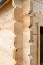 Log corner joint detail on the Dundalk CT Georgian 6-Person Outdoor Cabin Sauna