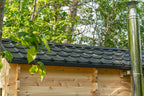 Roof edge and stove chimney pipe on the Dundalk CT Georgian 6-Person Cabin Sauna with Change Room