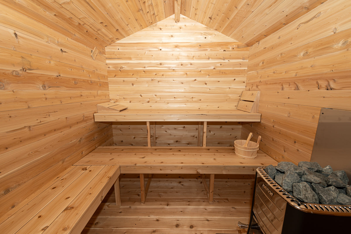 Interior of the Dundalk CT Georgian 6-Person Cabin Sauna with Change Room showing wooden benches