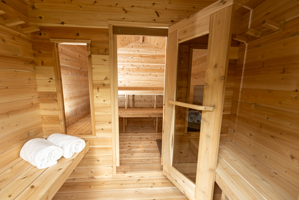 Change room inside the Dundalk CT Georgian 6-Person Cabin Sauna with Change Room with door to the sauna room