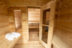 Change room inside the Dundalk CT Georgian 6-Person Cabin Sauna with Change Room with door to the sauna room