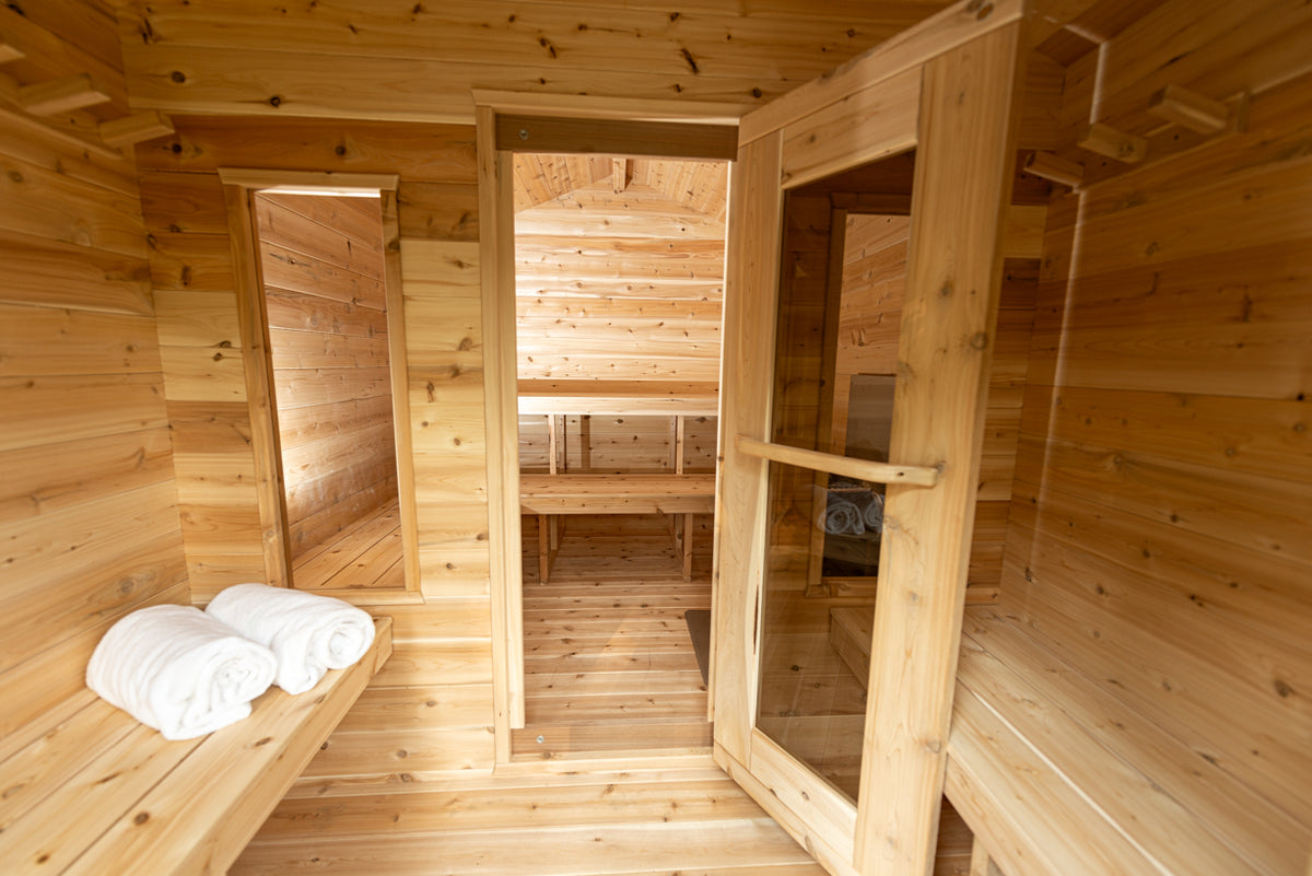 Change room inside the Dundalk CT Georgian 6-Person Cabin Sauna with Change Room with door to the sauna room