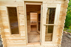 Front door with windows on the Dundalk CT Georgian 6-Person Cabin Sauna with Change Room