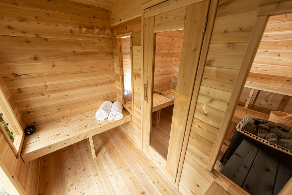 Change room bench and door inside the Dundalk CT Georgian 6-Person Cabin Sauna with Change Room
