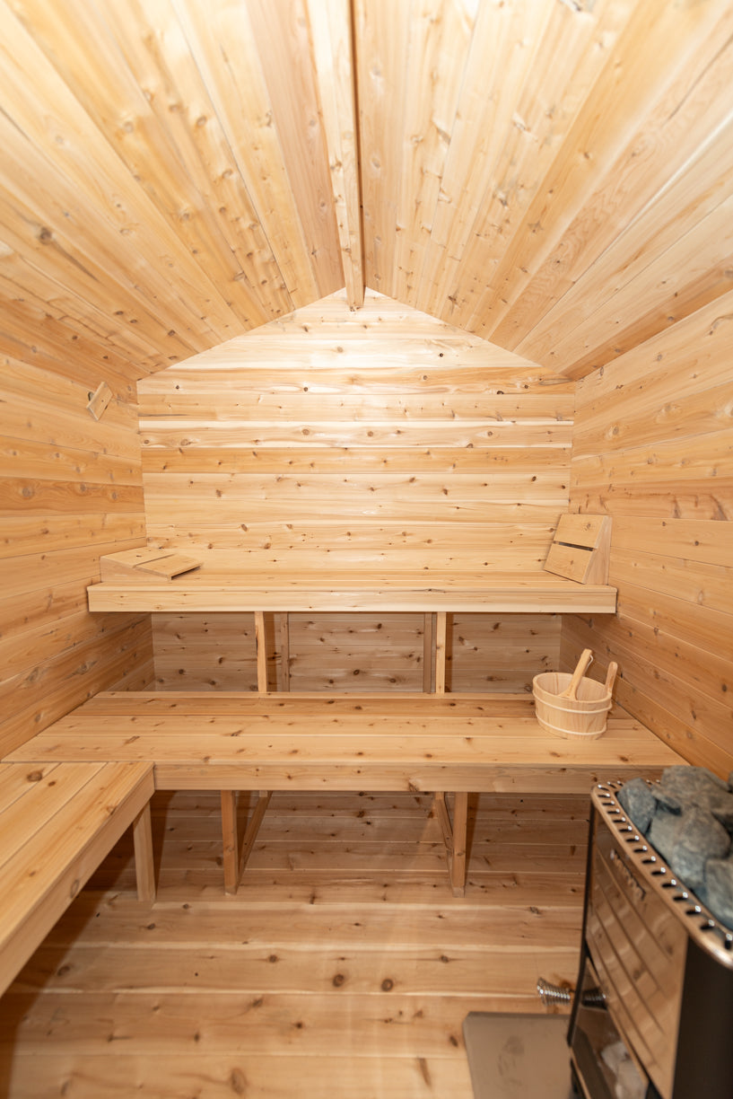 Upper and lower benches inside the Dundalk CT Georgian 6-Person Cabin Sauna with Change Room