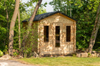 Dundalk CT Georgian 6-Person Cabin Sauna with Change Room exterior with front windows in a forest