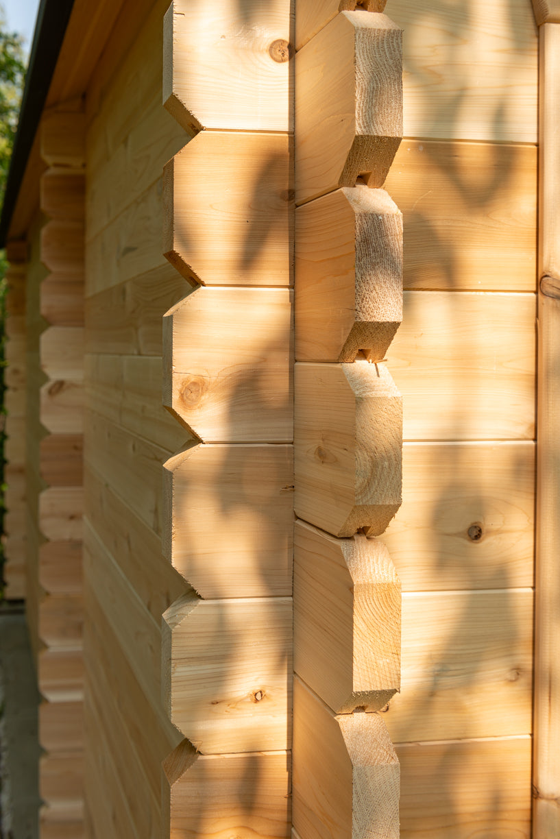 Log corner joint detail on the Dundalk CT Georgian 6-Person Cabin Sauna with Change Room