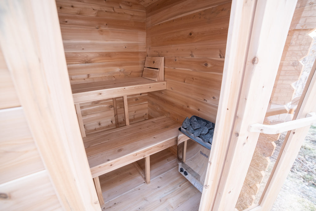 Interior of the Dundalk CT Granby 3-Person Outdoor Cabin Sauna with open door and benches