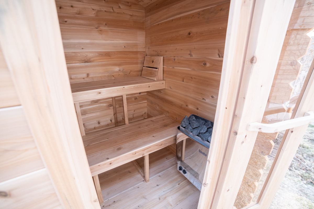 Interior of the Dundalk CT Granby 3-Person Outdoor Cabin Sauna with open door and benches