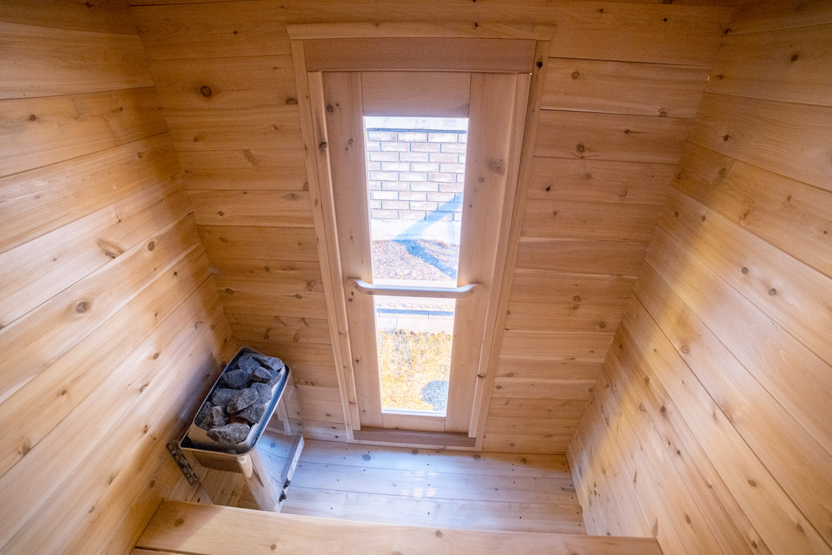 Interior of the Dundalk CT Granby 3-Person Outdoor Cabin Sauna with door window and heater