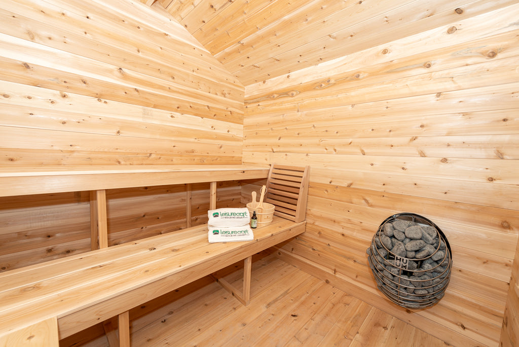 Interior of the Dundalk CT Georgian 6-Person Cabin Sauna with Porch with benches and wall-mounted heater
