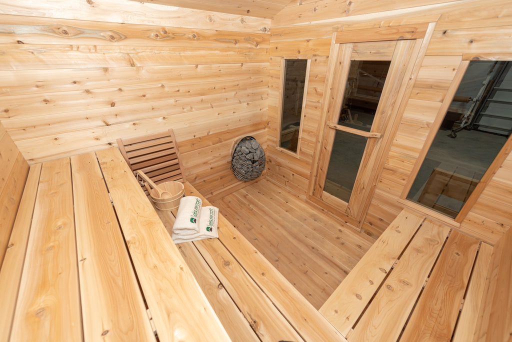 Interior of the Dundalk CT Georgian 6-Person Cabin Sauna with Porch with narrow windows and benches