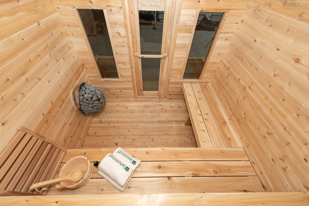 Corner benches and narrow windows inside the Dundalk CT Georgian 6-Person Cabin Sauna with Porch