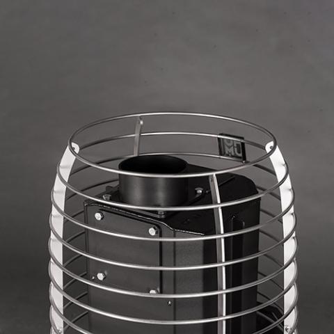 Close-up of the stainless steel stone cage and chimney connection on the Huum Hive Flow Mini 8.5kW wood-burning sauna stove