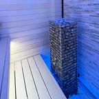 Huum Cliff 6kW Sauna Heater in a sauna with blue lighting and white benches