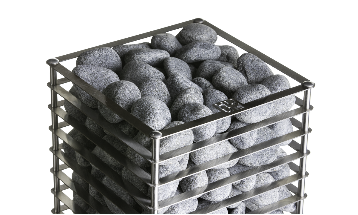Top view of the Huum Cliff 6kW Sauna Heater stone cage with sauna stones, angled