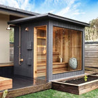 Outdoor sauna cabin with glass wall and Huum Drop 7.5kW Sauna Heater inside