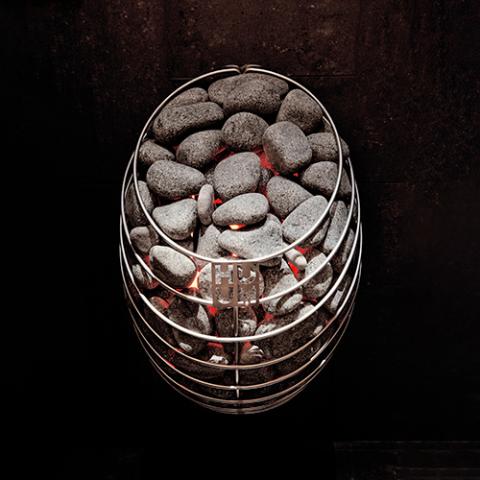 Huum Drop 6kW Sauna Heater with sauna stones and glowing red elements
